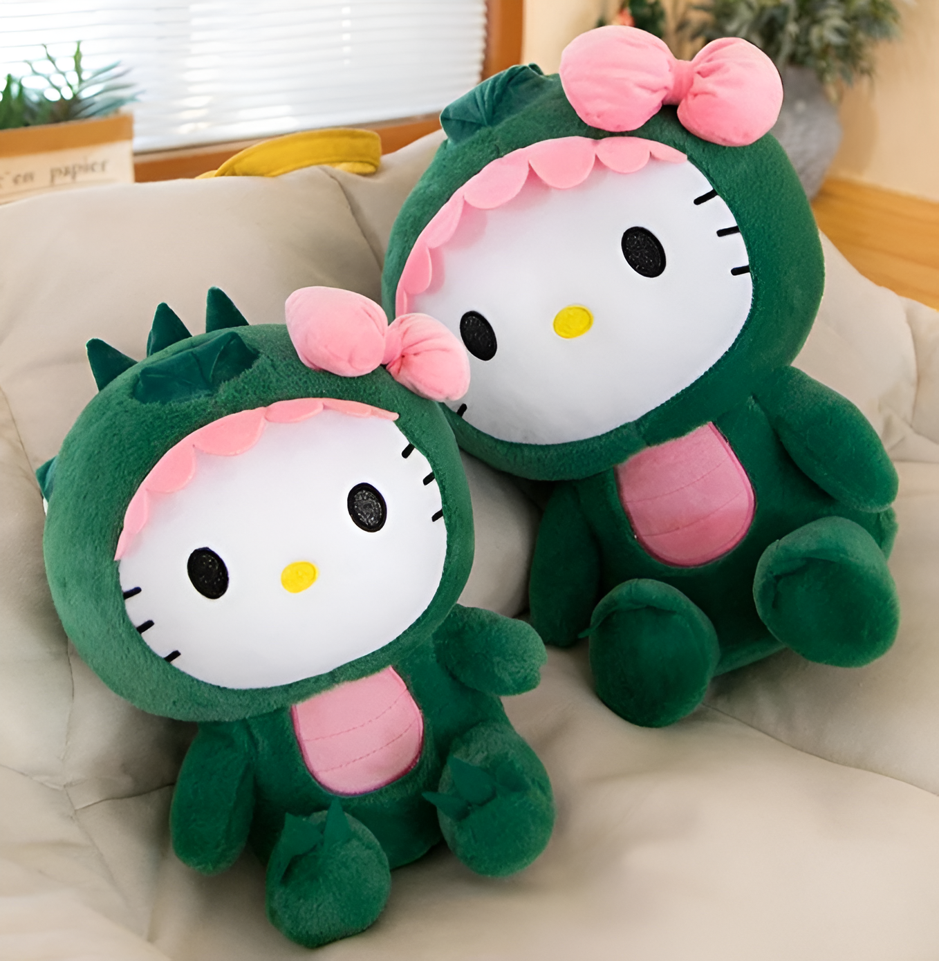 Gatito dinosaurio de peluche